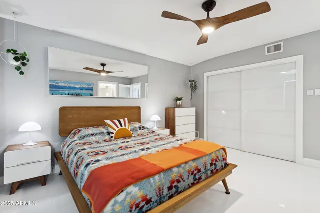 a view of a lake with houses in the back