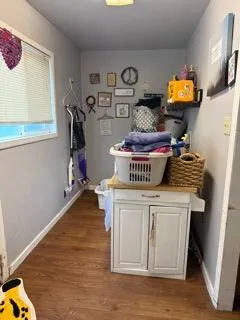 a view of a backyard with sitting area