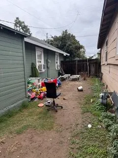 a bedroom with bed and window
