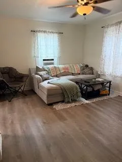 a bed room with a bed and a television