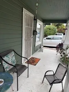 a view of an outdoor dining space with furniture
