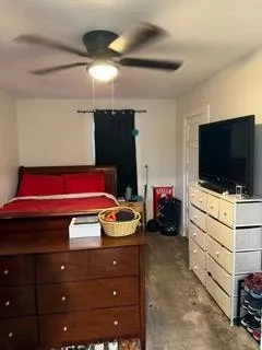 a kitchen with a stove and a refrigerator