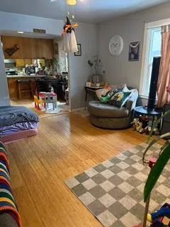 a bedroom with a bed and flat screen tv