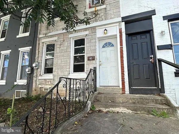 a front view of a house with a porch