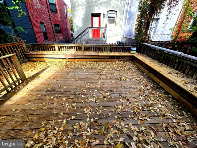 a view of swimming pool with outdoor seating