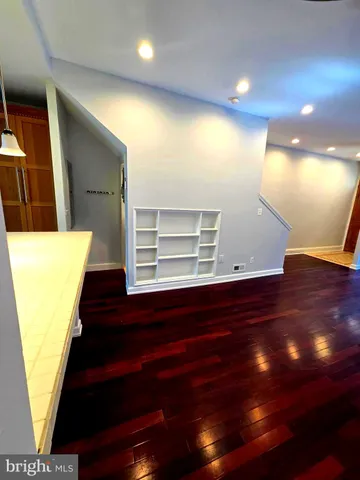 a view of kitchen with wooden floor