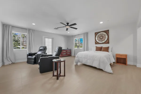 a bedroom with a bed and a closet