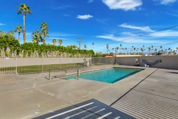 a view of a house with a swimming pool