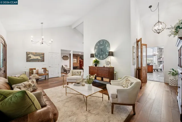 a bathroom with a double vanity sink mirror and shower