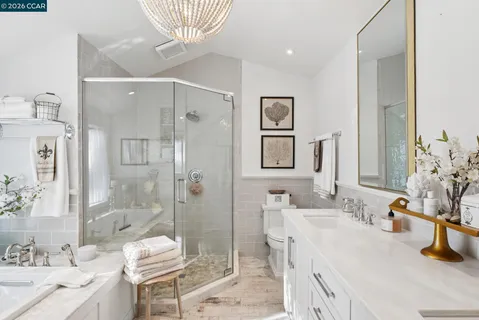 a bedroom with a bed and a table