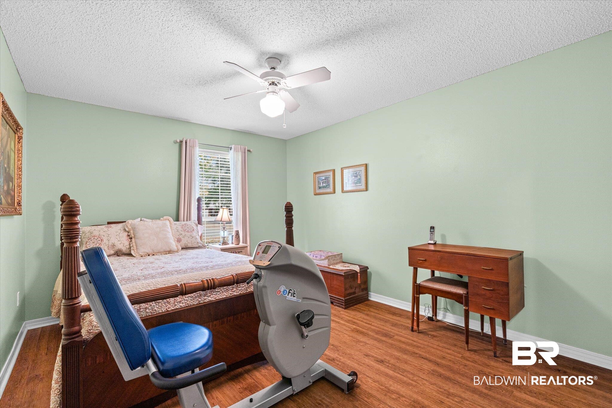 25825 Austin Road Daphne, AL 36526 - Photo 15 of 30 Bedroom with wood finished floors, a textured ceiling, and a ceiling fan