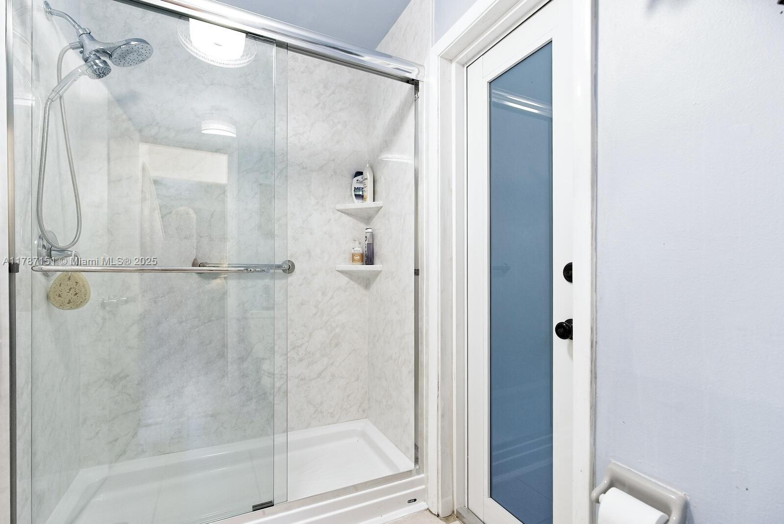 Kendall Miami, FL 33176 - Photo 16 of 26 a bathroom with a shower