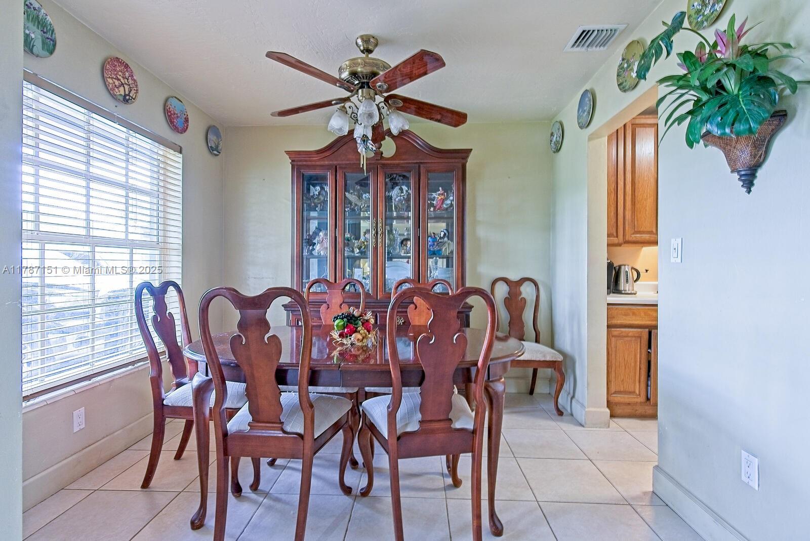 Kendall Miami, FL 33176 - Photo 5 of 26 a dining room with furniture and window