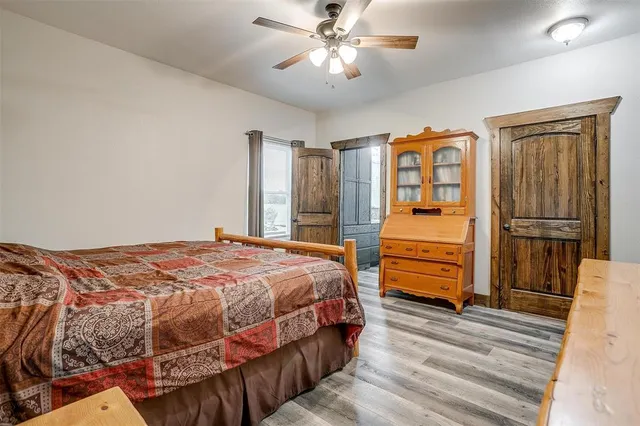 a bathroom with a sink a mirror and a shower