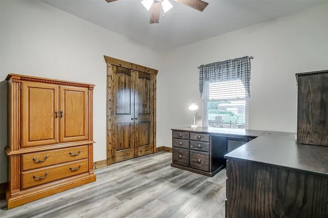 a bathroom with a double vanity sink toilet and shower