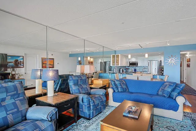 a living room with furniture and a table