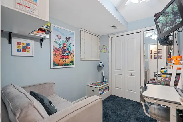 a room with furniture and a window