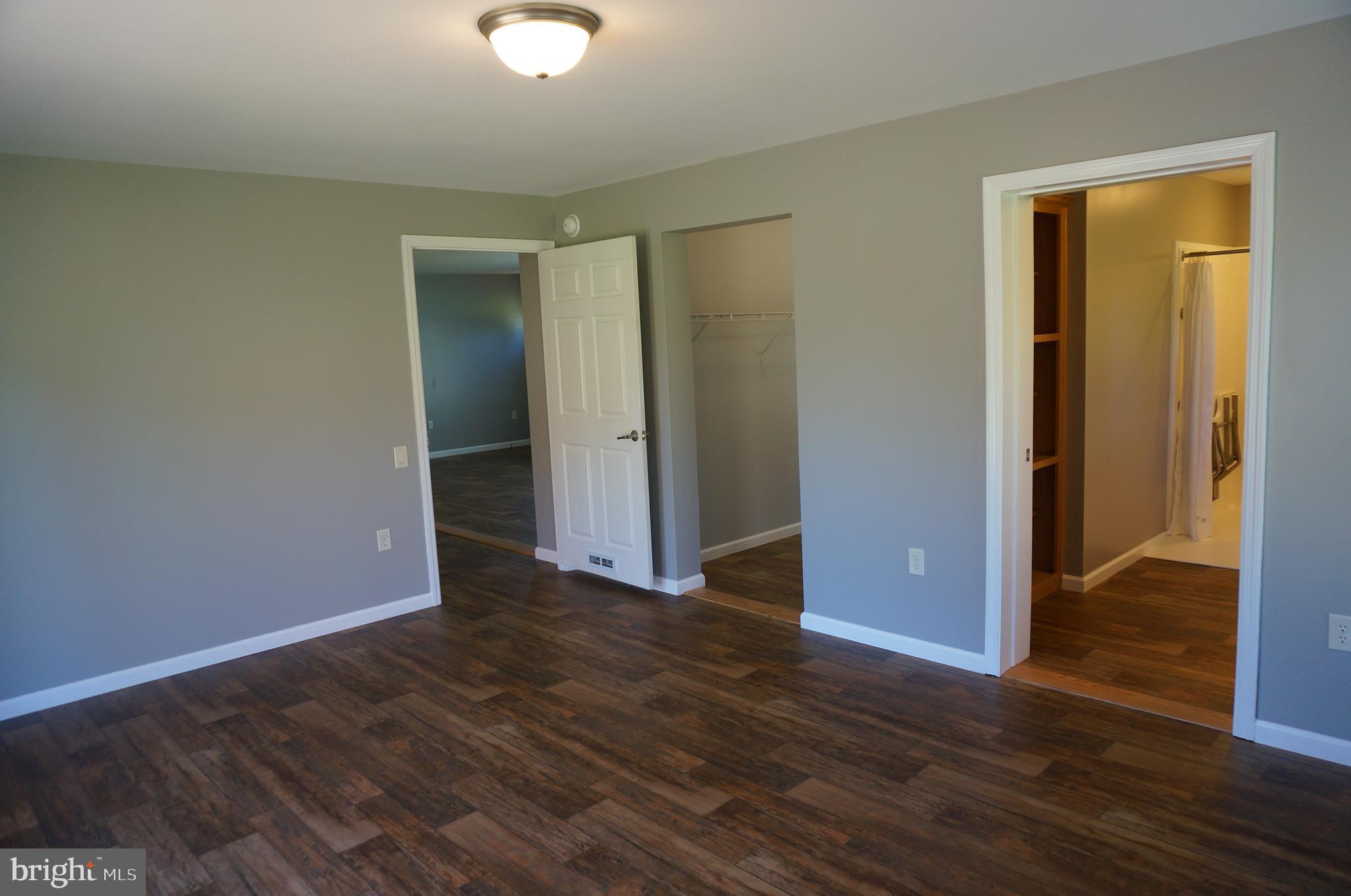 14351 Tollgate Ridge Road Hancock, MD 21750 - Photo 26 of 54 MBR Shows Door To MBR Bath, Walk- In Closet & Kit