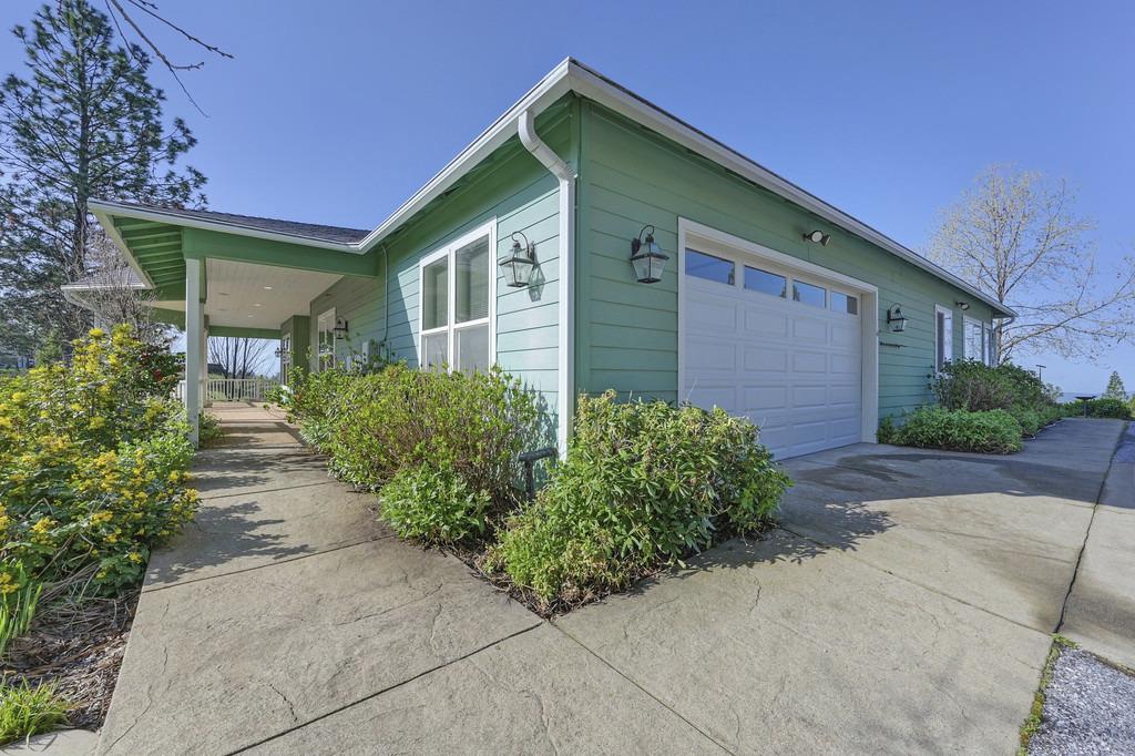 5901 Traverse Creek Road Garden Valley, CA 95633 - Photo 12 of 98 view of side of property with a garage and driveway