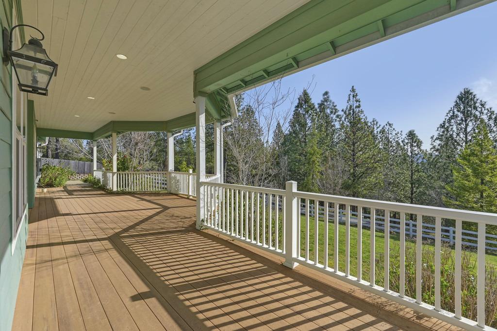 5901 Traverse Creek Road Garden Valley, CA 95633 - Photo 18 of 98 a view of a balcony with wooden floor