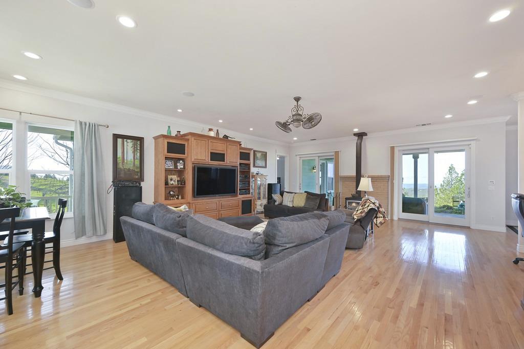 5901 Traverse Creek Road Garden Valley, CA 95633 - Photo 24 of 98 a living room with furniture and a large window