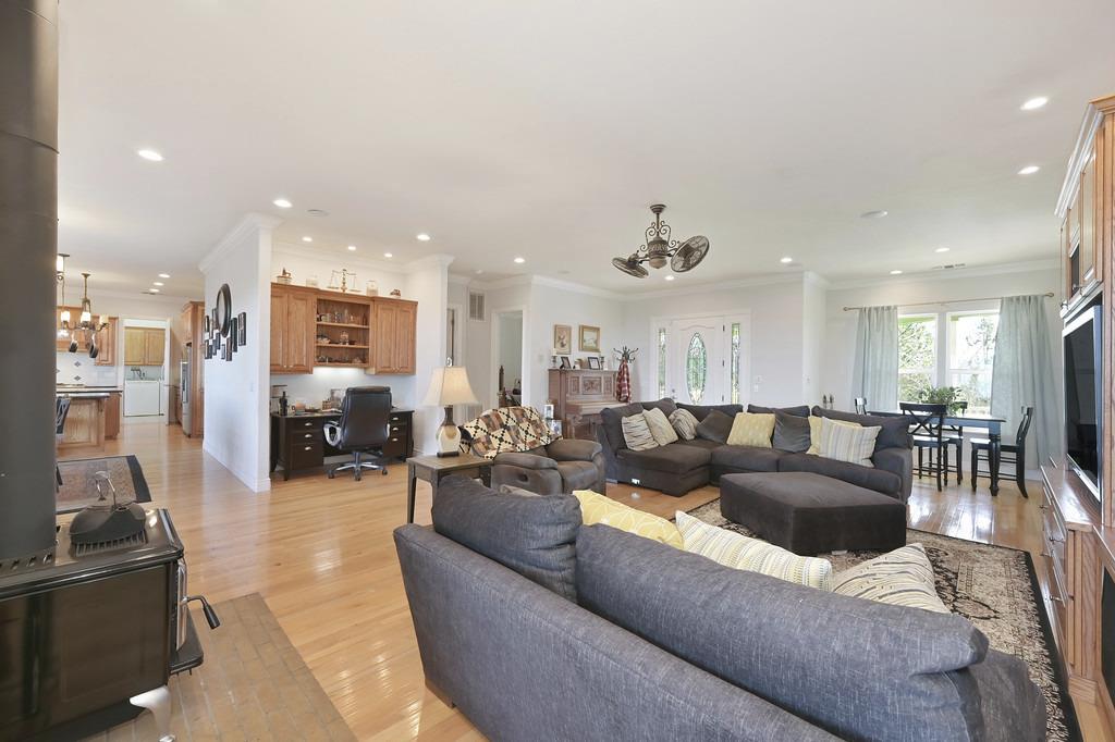 5901 Traverse Creek Road Garden Valley, CA 95633 - Photo 30 of 98 a living room with furniture and a large window