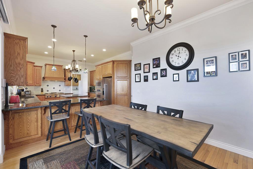 5901 Traverse Creek Road Garden Valley, CA 95633 - Photo 40 of 98 a view of a dining room with furniture and a table
