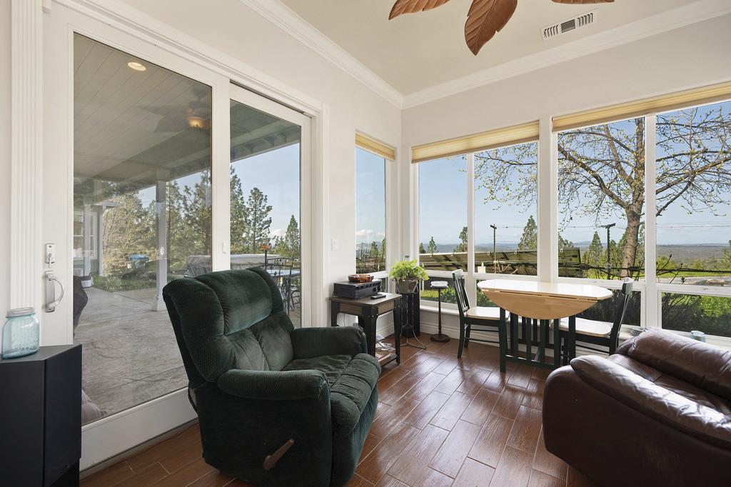 5901 Traverse Creek Road Garden Valley, CA 95633 - Photo 54 of 98 a living room with furniture and large windows