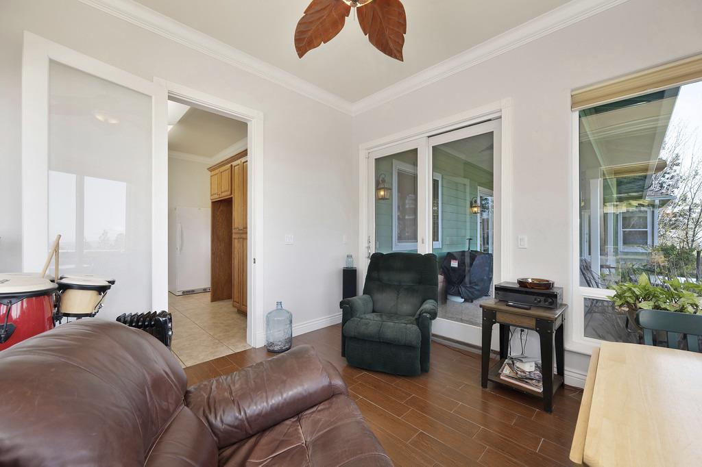 5901 Traverse Creek Road Garden Valley, CA 95633 - Photo 55 of 98 a living room with furniture and a potted plant