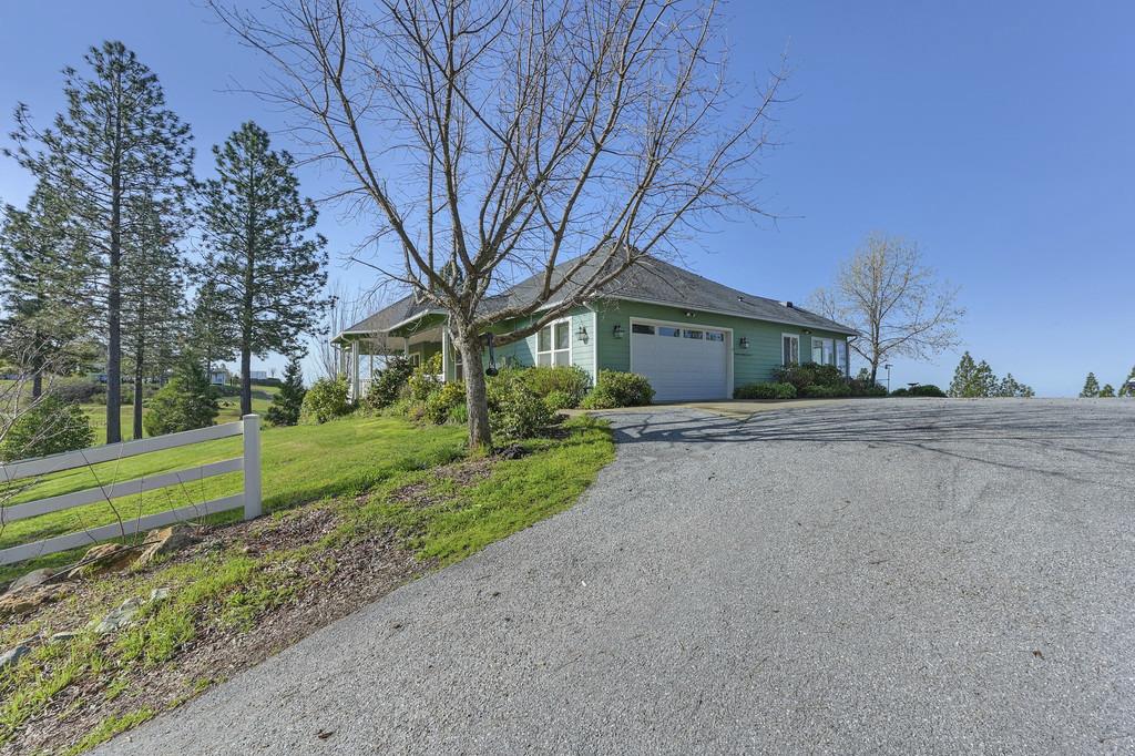 5901 Traverse Creek Road Garden Valley, CA 95633 - Photo 8 of 98 a front view of a house with a yard