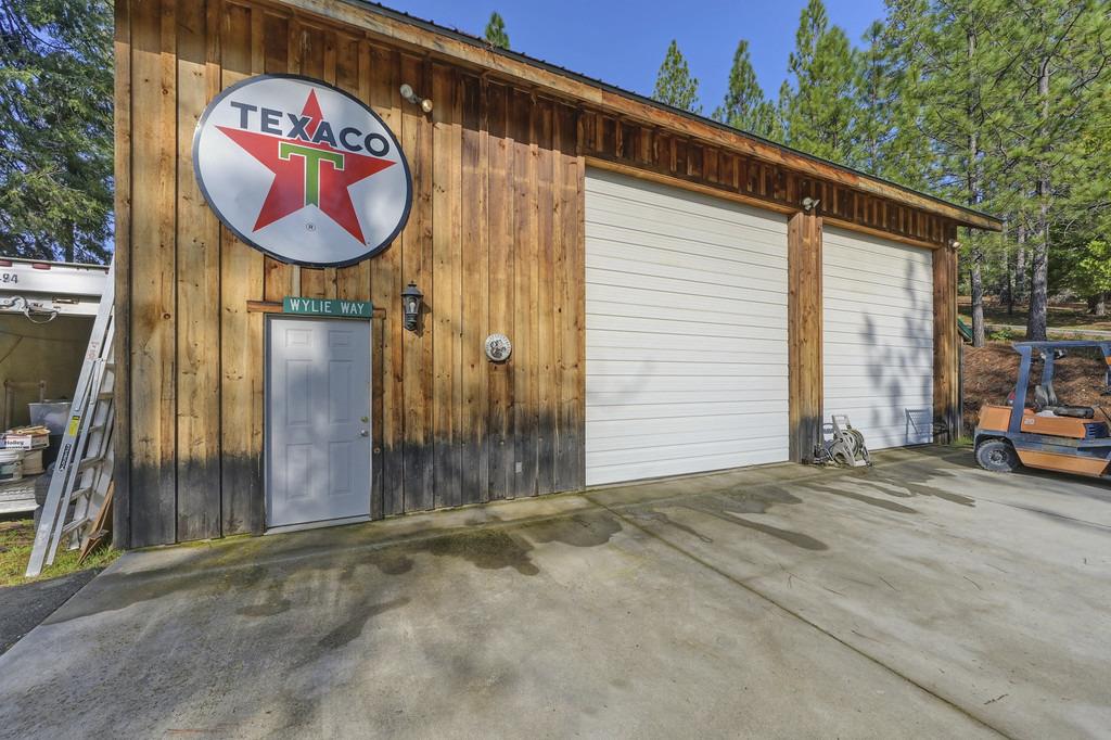 5901 Traverse Creek Road Garden Valley, CA 95633 - Photo 81 of 98 a sign that is on the side of a building