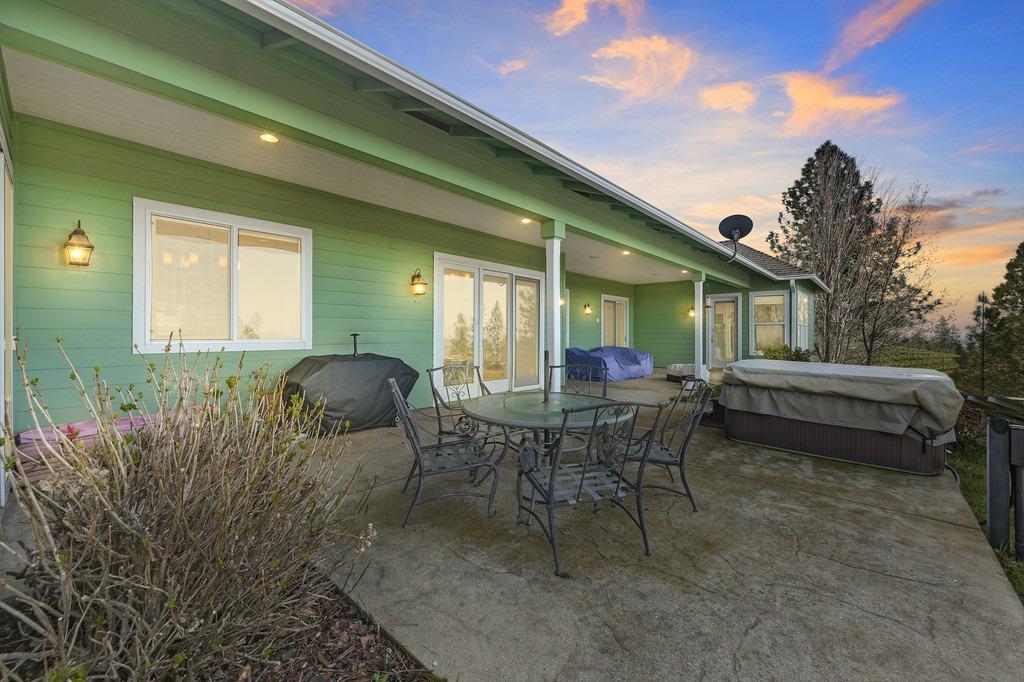 5901 Traverse Creek Road Garden Valley, CA 95633 - Photo 88 of 98 a view of a house with backyard and sitting area