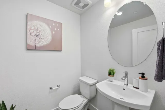 a view of kitchen with cabinets and wooden floor
