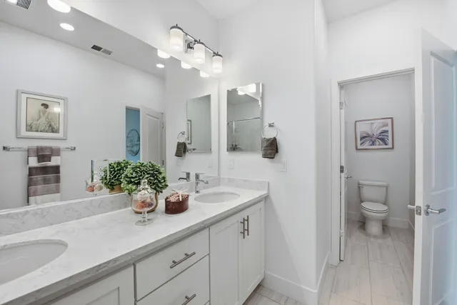a view of hallway with livingroom and furniture
