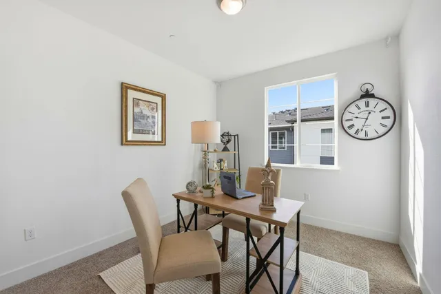 a workspace with furniture and a couch