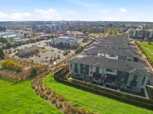 a view of a city with tall buildings in the background