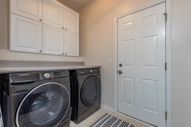 a white toilet sitting next to a bathroom sink