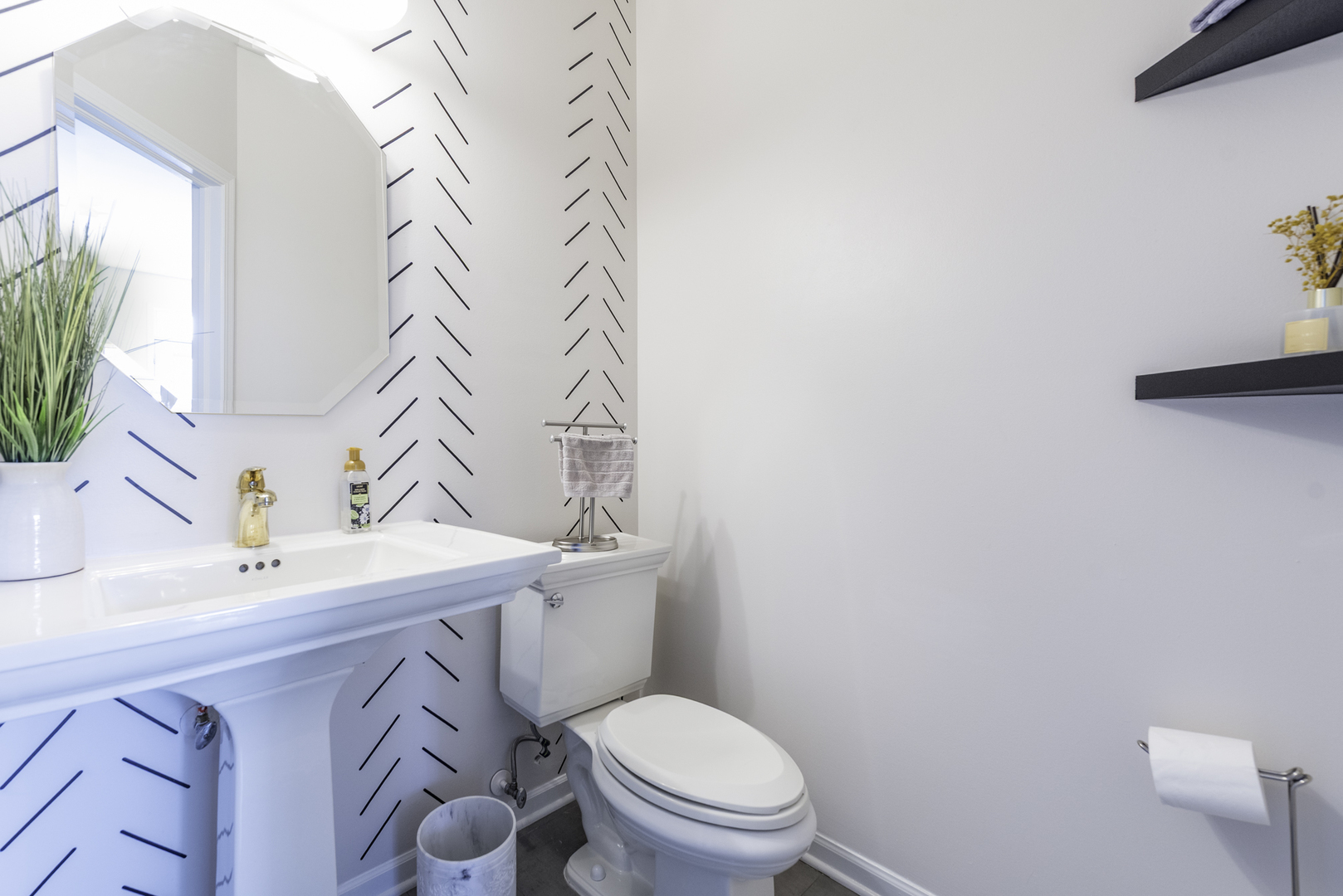 1650 Natures Way Lindenhurst, IL 60046 - Photo 25 of 55 a white toilet sitting next to a bathroom sink