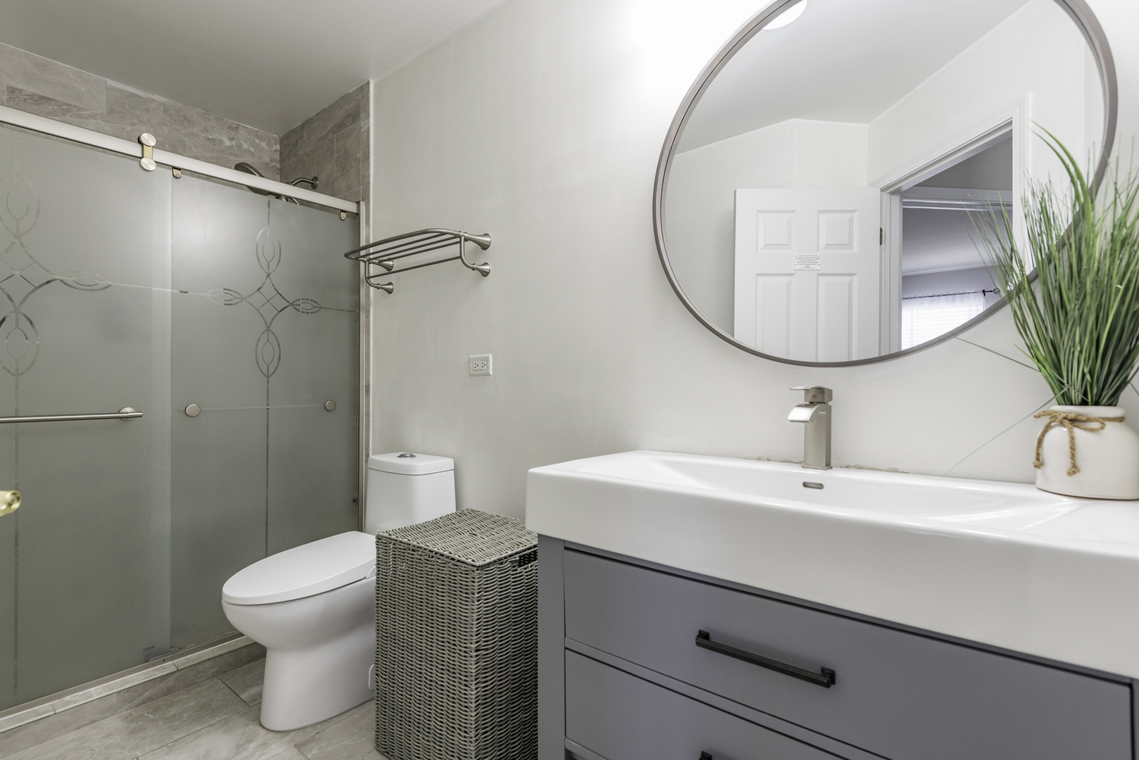 1650 Natures Way Lindenhurst, IL 60046 - Photo 31 of 55 a bathroom with a sink toilet and a mirror
