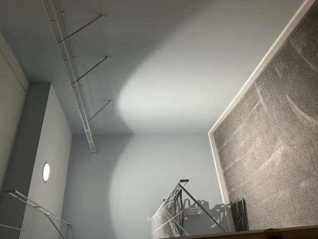 a view of a backyard with sitting area