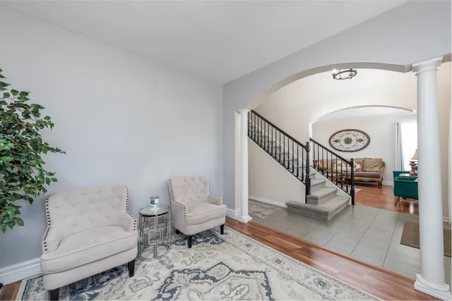 a living room with furniture and a table