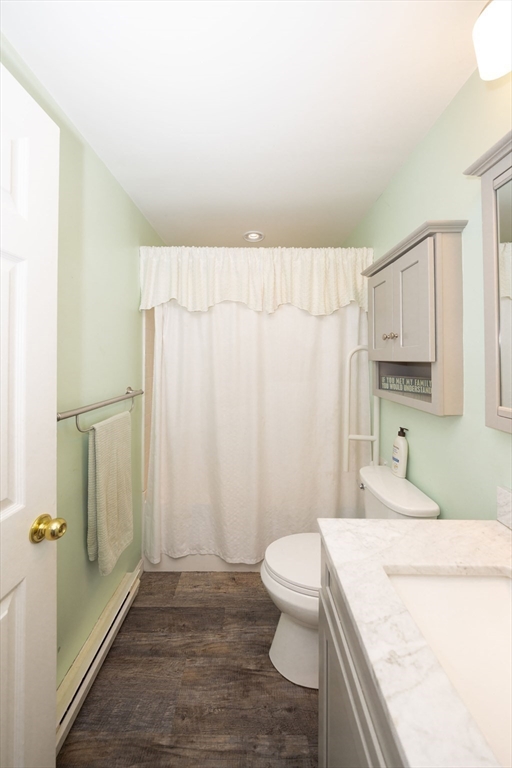 1195 Grafton Street, Unit 19 Worcester, MA 01604 - Photo 15 of 22 a bathroom with a sink a toilet and shower