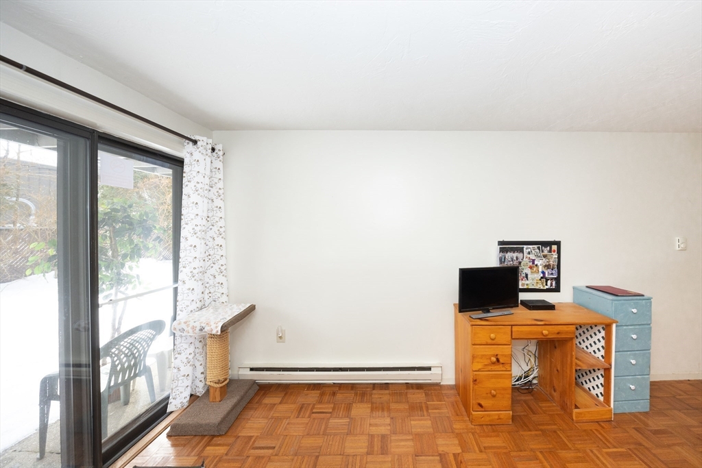 1195 Grafton Street, Unit 19 Worcester, MA 01604 - Photo 6 of 22 a view of a livingroom with furniture and front door