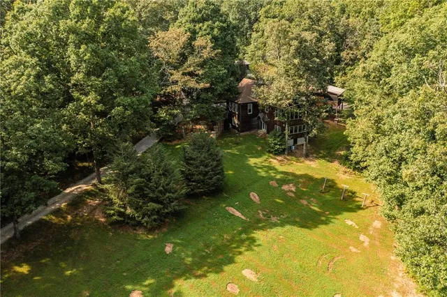 a kitchen with stainless steel appliances granite countertop a stove top oven a sink and dishwasher