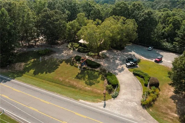 a bedroom with a bed and a table