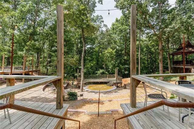 a outdoor space with patio the couches and a dining table with chairs