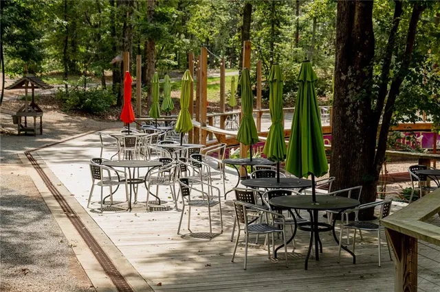 a bathroom with a sink a mirror and a bathtub