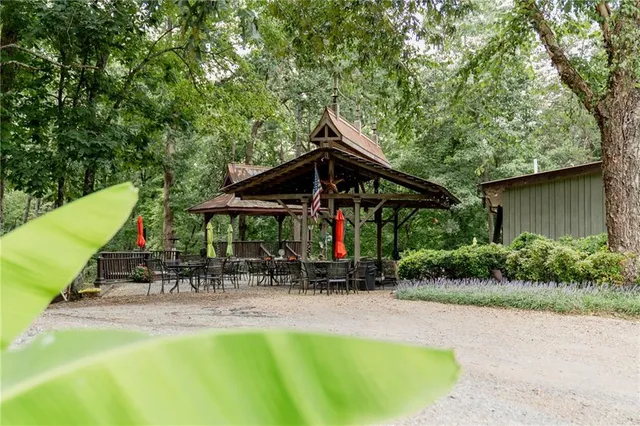 a outdoor living space with furniture and garden view