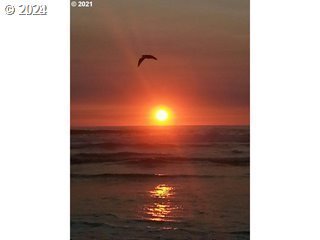 57 Meadowview, Unit 57 Cloverdale, OR 97112 - Photo 2 of 3 a view of a sky from a hallway