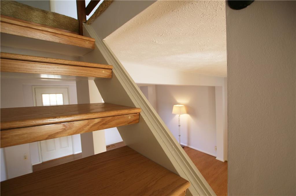 105 Rossmor Court Pittsburgh, PA 15229 - Photo 19 of 24 Looking Into Living Room From Stairs
